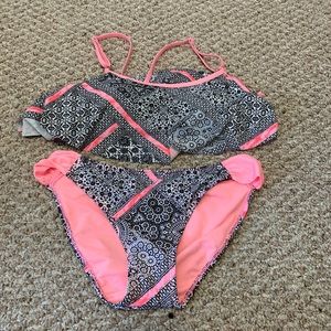 Pink and black ruffle swimsuit